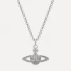 Man. Mini Bas Relief Orb Pendant Necklace